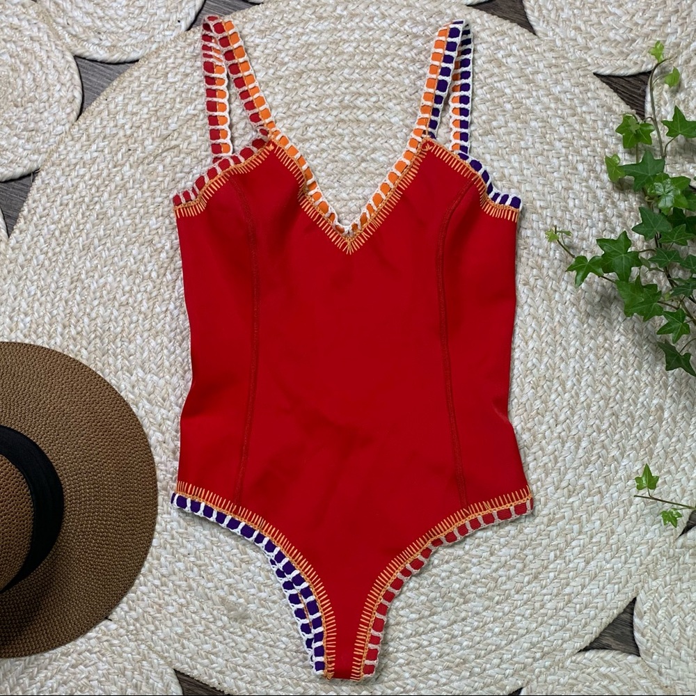 KINI True RED one piece with multi coloured crotchet & elastic trim.
